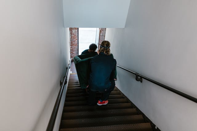 SpeedyPack apartment movers navigating tight hallways in Peterborough
