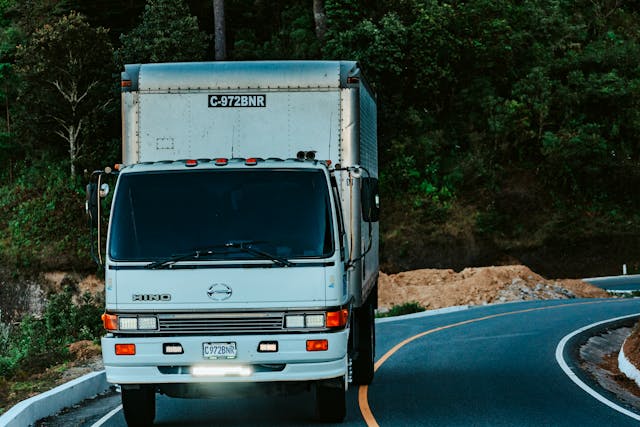 Long distance moving Ontario — SpeedyPack Movers truck leaving Peterborough